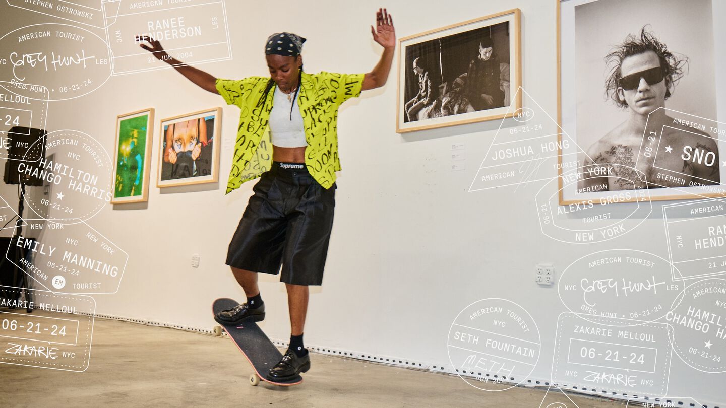 Photo of Beatrice Domond on a skateboard at the American Tourist Art Show.